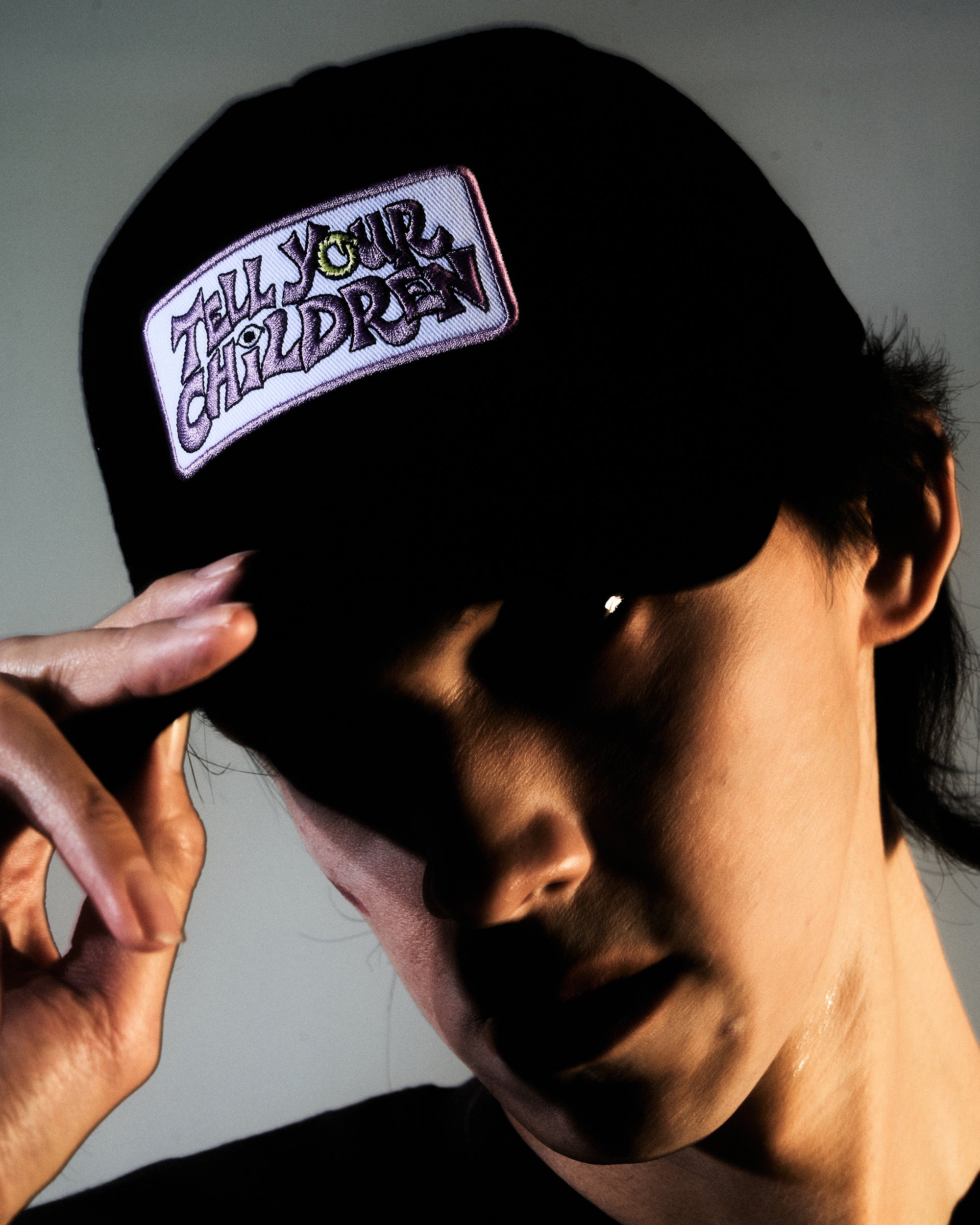OUROBOROS PATCH TRUCKER CAP - BLACK