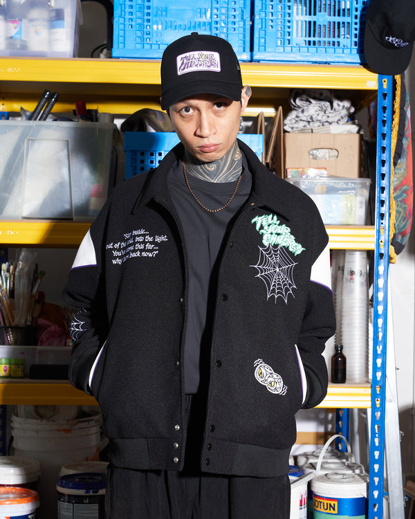 SHADOWY VOICES VARSITY JACKET - BLACK