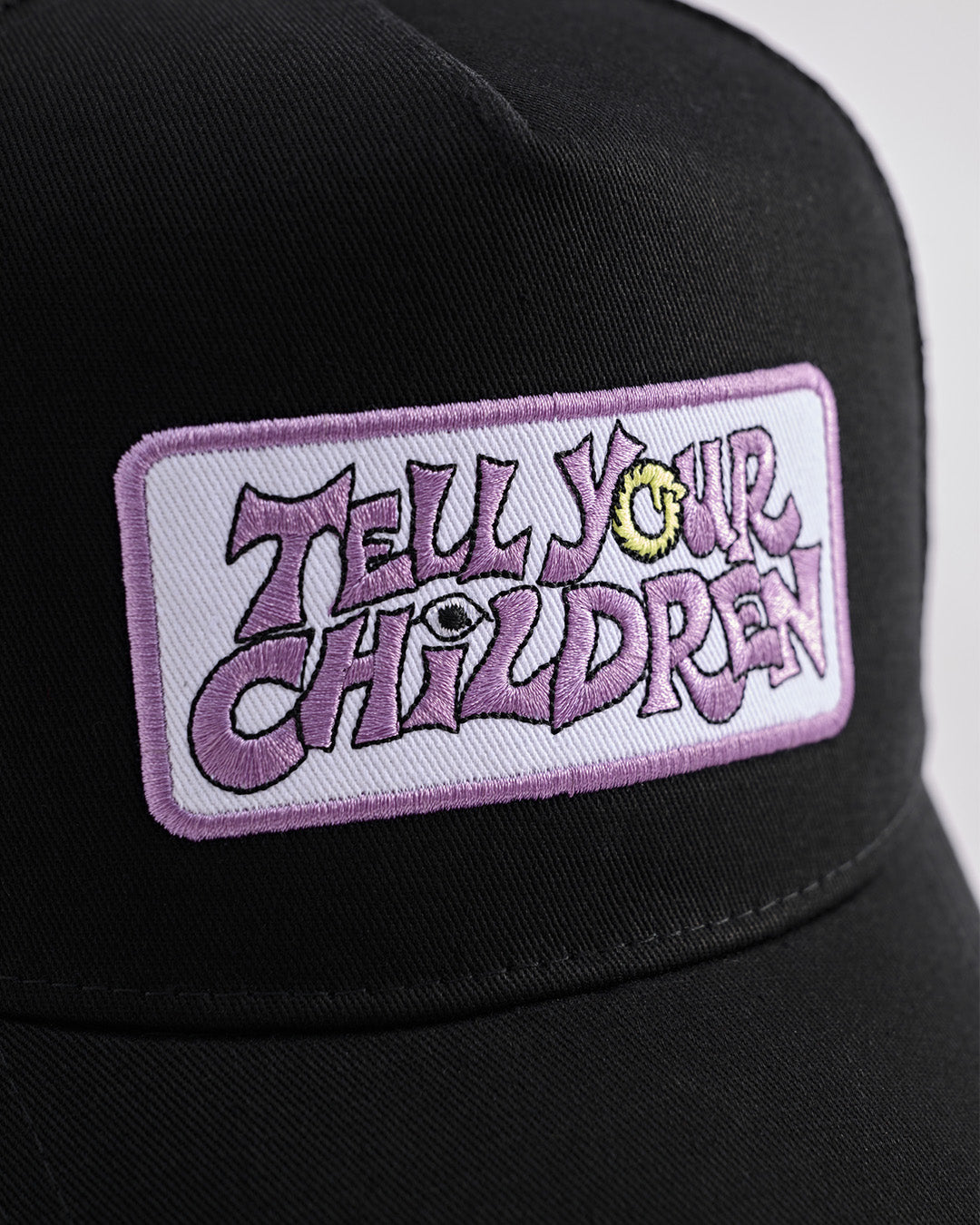 OUROBOROS PATCH TRUCKER CAP - BLACK