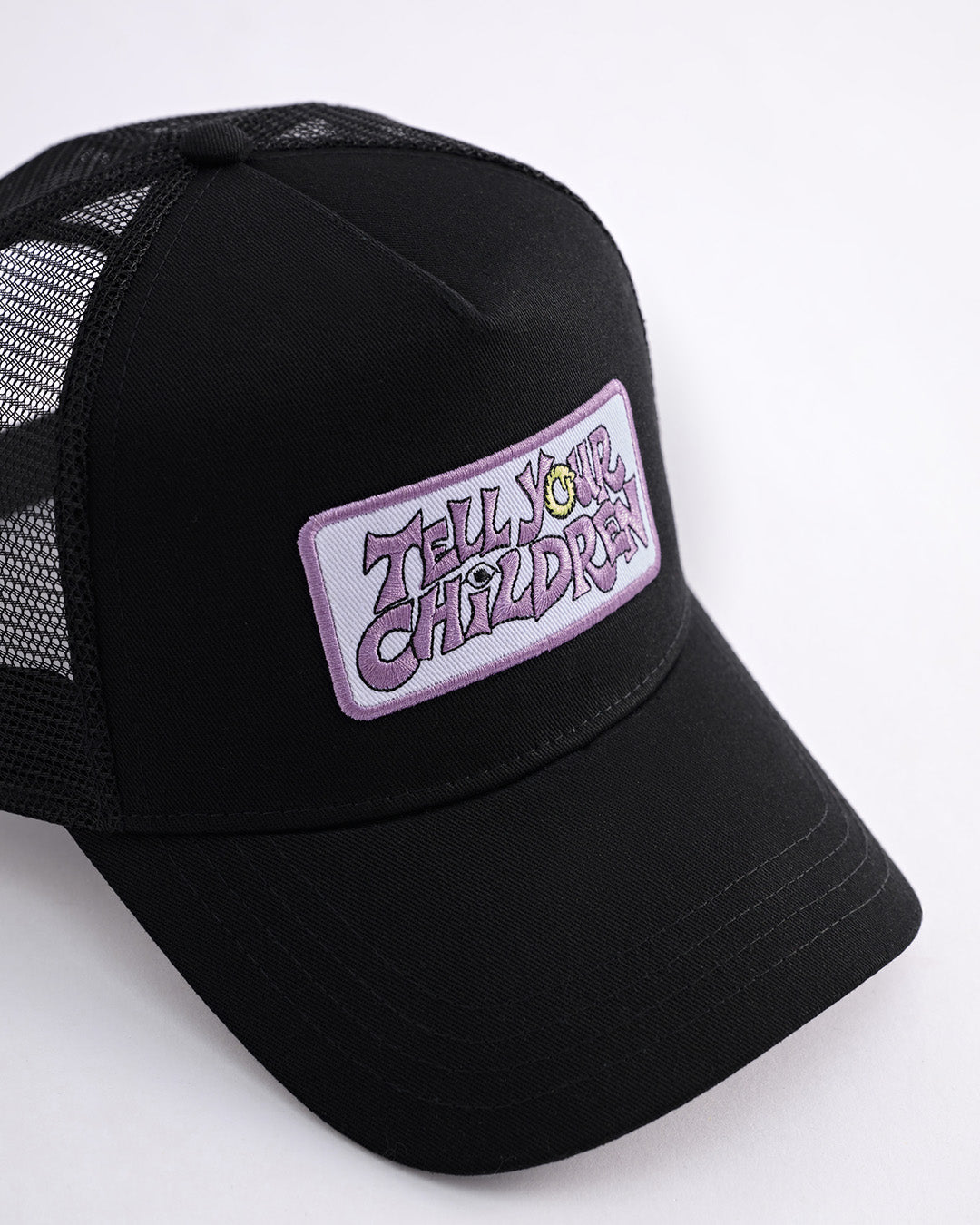 OUROBOROS PATCH TRUCKER CAP - BLACK